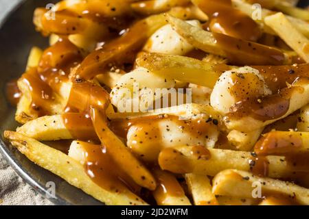 Fritture alla francese di formaggio con sugo di carne e formaggi fatti in casa Foto Stock