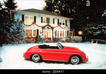 Auto sulla coperta di neve prato, sarò a casa per Natale, 1998 Foto Stock