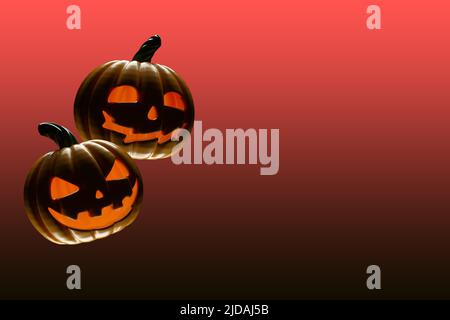 Halloween zucche spaventose gialle con occhi rossi 3D rendono Foto Stock