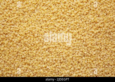 Stelline Pasta cruda biologica, vista dall'alto. Disposizione piatta, sovratesta, dall'alto. Foto Stock