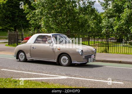 1991 90s n90 Nissan Figaro 980cc benzina concept car; automobili ha presentato durante l'anno 58th del Manchester to Blackpool Touring Assembly per Veteran, Vintage, Classic e le auto care. Foto Stock