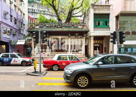 Hong Kong, 25,2019 marzo: Vista esterna del piccolo Tempio di Hung Shing situato a WAN Chai, Hong Kong durante una giornata nuvolosa Foto Stock