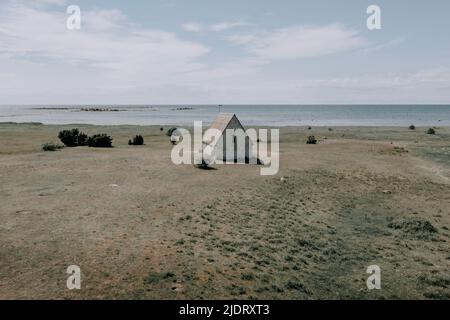 Ein kleines Fischerhaus a Kovik, Gotland, Schweden. Driekt am Meer Foto Stock