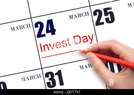 24th marzo. Disegno a mano linea rossa e scrittura del testo Invest Day in data calendario marzo 24. Concetto commerciale e finanziario. Primavera mese, giorno Foto Stock