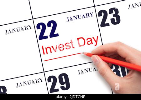 22nd gennaio. Disegno a mano linea rossa e scrittura del testo Invest Day in data calendario Gennaio 22. Concetto commerciale e finanziario. Mese invernale, Foto Stock