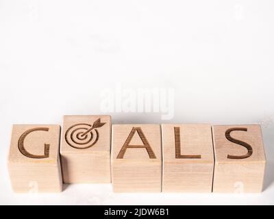 Texte sur GOALS on wooden blocks as motivation concept Foto Stock