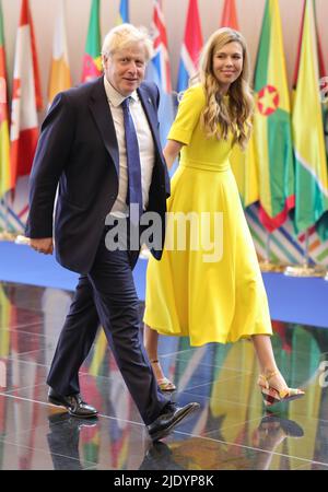 Il primo Ministro Boris Johnson e sua moglie Carrie Johnson partecipano alla cerimonia di apertura del Consiglio dei Capi di Governo del Commonwealth (CHOGM) presso il Centro Congressi di Kigali in Ruanda. Data foto: Venerdì 24 giugno 2022. Foto Stock