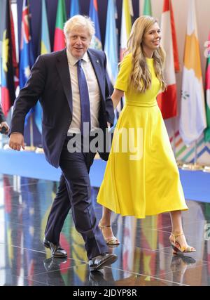 Il primo Ministro Boris Johnson e sua moglie Carrie Johnson partecipano alla cerimonia di apertura del Consiglio dei Capi di Governo del Commonwealth (CHOGM) presso il Centro Congressi di Kigali in Ruanda. Data foto: Venerdì 24 giugno 2022. Foto Stock