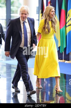 Il primo Ministro Boris Johnson e sua moglie Carrie Johnson partecipano alla cerimonia di apertura del Consiglio dei Capi di Governo del Commonwealth (CHOGM) presso il Centro Congressi di Kigali in Ruanda. Data foto: Venerdì 24 giugno 2022. Foto Stock