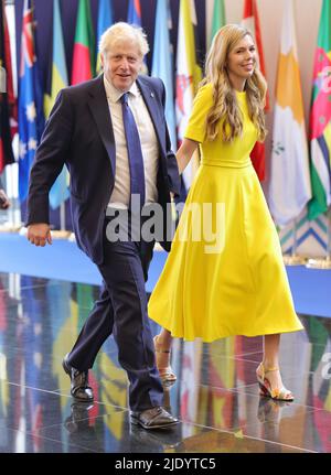 Il primo Ministro Boris Johnson e sua moglie Carrie Johnson partecipano alla cerimonia di apertura del Consiglio dei Capi di Governo del Commonwealth (CHOGM) presso il Centro Congressi di Kigali in Ruanda. Data foto: Venerdì 24 giugno 2022. Foto Stock