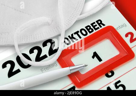 Calendario tedesco 2022 Ottobre 1 Sabato e Corona FFP2 Mask Foto Stock