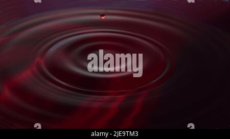 Foto delle gocce d'acqua: Gocce d'acqua rosse Foto Stock