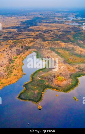 Vista aerea, le paludi di Okavango, il delta dell'Okavango, patrimonio dell'umanità dell'UNESCO, il Ramsar Wetland, il Botswana, l'Africa Foto Stock