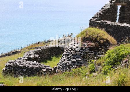 Resti di un chiochan sulla penisola di Dingle Foto Stock