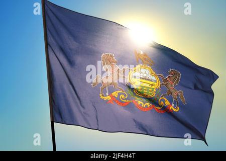 Stato della Pennsylvania della bandiera degli Stati Uniti che sventola sul vento Foto Stock