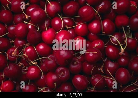 Sfondo vista dall'alto delle ciliegie dolci mature. Primo piano frutta. Foto Stock