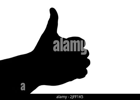 Silhouette a mano libera nera con un pollice sollevato su sfondo bianco. Mi piace. Foto Stock