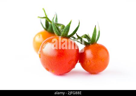 Chiudere i pomodori rossi su sfondo bianco Foto Stock