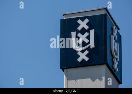 Amsterdam, Paesi Bassi - 23 giugno 2022: Logo dell'Università di Amsterdam Foto Stock