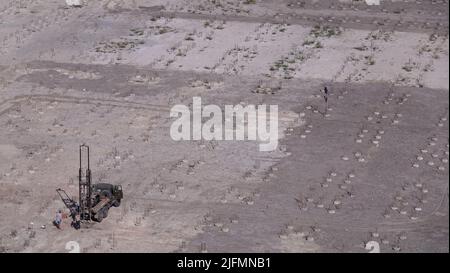 Kiev, Ucraina 30 agosto 2019: Lavoro della perforatrice nel luogo di costruzione della casa Foto Stock