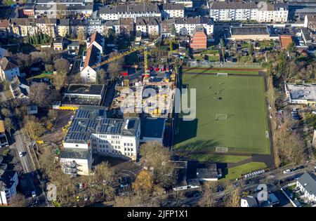 Vista aerea, cantiere per la scuola elementare vicino alla Scuola Feldsieper con tetto solare e campo sportivo nel distretto di Hamme a Bochum, zona della Ruhr, N Foto Stock