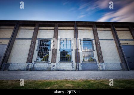 Edificio storico della galleria del vento R52 sul sito dell'ex Royal Aircraft Establishment (RAE) a Farnborough, Hampshire, Regno Unito Foto Stock