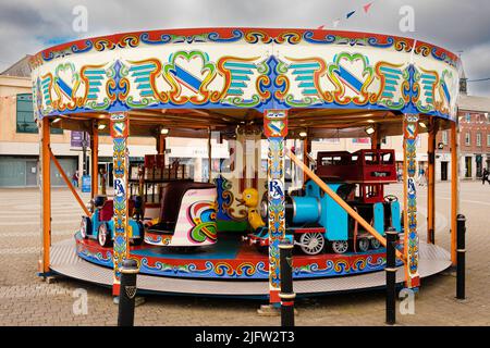 Giostra per bambini su Lemon Quay, Truro, Cornovaglia Foto Stock