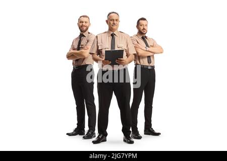 Ritratto completo di squadra di guardie di sicurezza in uniformi isolate su sfondo bianco Foto Stock