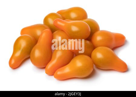 Mucchio di pomodori gialli interi della pera isolato su sfondo bianco da vicino Foto Stock