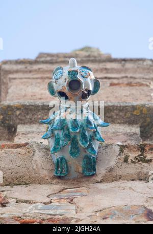 Porcellana gargoyle del Palazzo di Weathervanes, Caceres quartiere storico, Extremadura, Spagna Foto Stock