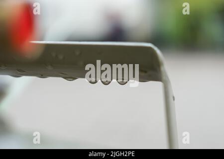 Gocce d'acqua su una bombola di gas Foto Stock