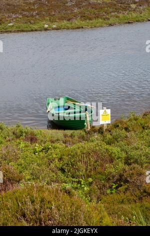 Barca a remi a Loch Druidibeag, South Uist, Ebridi esterne Foto Stock