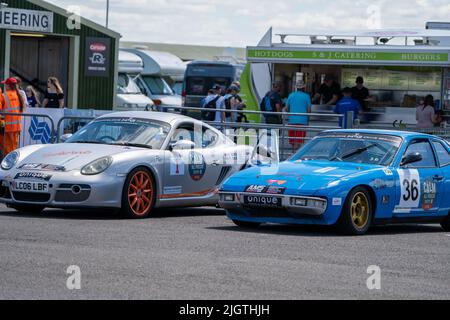 CALMO tutti i Trofei Porsche ai box Foto Stock