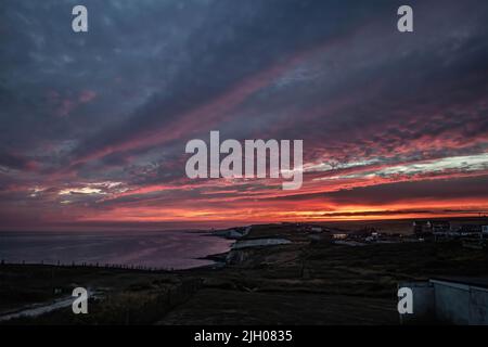 Brighton, UK, 13th luglio 2022, Tramonto preso dalla cima della scogliera 6 miglia ad est di Brighton 13th luglio 2022 Foto Stock