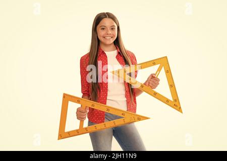 felice bambino tenere triangolo regolo studio algebra a scuola isolato su bianco, di nuovo a scuola Foto Stock