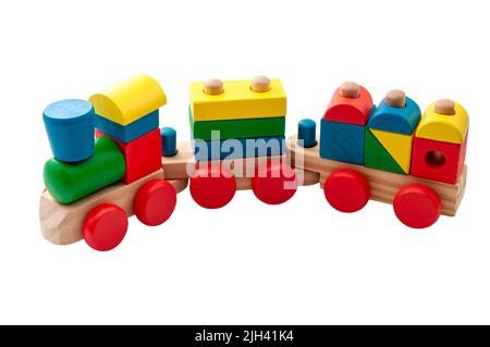 Modello di treno giocattolo vintage realizzato in blocchi di varie forme isolati su sfondo bianco con un concetto di ritaglio percorso per lo sviluppo infantile, mini Foto Stock