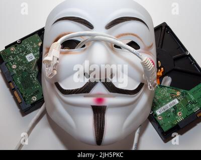 Guy Fawkes come maschera hacker stile anonimo. Immagini eccellenti per applicazioni di cybersicurezza. Foto Stock