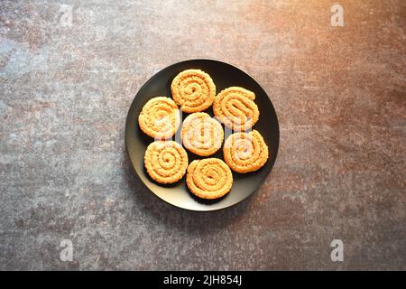 Chakli fritto indiano tradizionale saporito snack food Foto Stock
