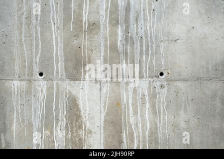 Vecchio muro in cemento grezzo intemperiato, grunge sfondo Foto Stock