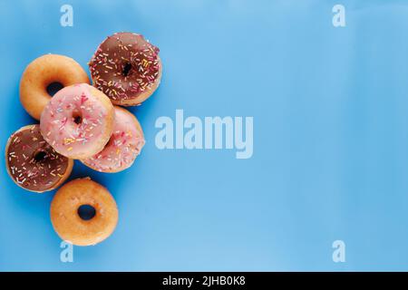 Krispy Kreme arrangiamento piatto ciambella/ciambella Foto Stock