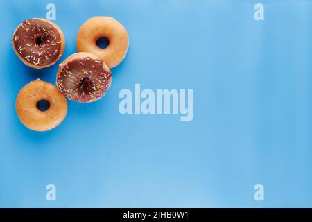 Krispy Kreme arrangiamento piatto ciambella/ciambella Foto Stock