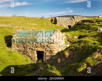 Mulini ad acqua orizzontali della metà del 19th secolo a Huxter sulle Shetland di Mainland, Scozia, Regno Unito. Foto Stock