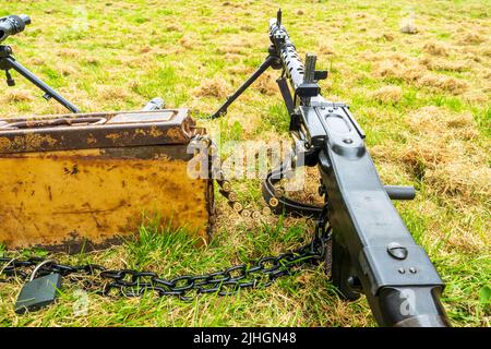 Seconda guerra mondiale pistola tedesca Mg34. Dettaglio che mostra il nastro di munizioni Gurt 34 Metallic-link e l'alimentazione nella mitragliatrice. Foto Stock