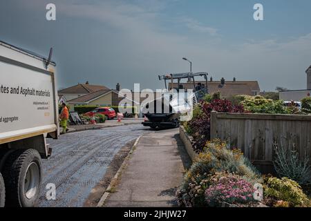 Cormac Groundworks relaying strada asfaltata Foto Stock