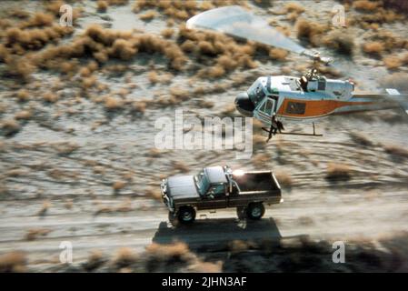 Auto, un elicottero CHASE scena, la caduta GUY, 1981 Foto Stock