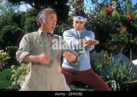 PAT MORITA, RALPH MACCHIO, The Karate Kid - La leggenda continua la parte III, 1989 Foto Stock