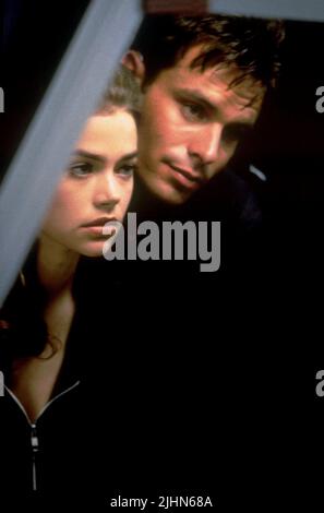 DENISE RICHARDS, PATRICK MULDOON, Starship Troopers, 1997 Foto Stock