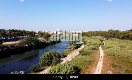 Roma, Fiume Tevere in magra estiva e non in secca , ponte Marconi San Paolo Foto Stock