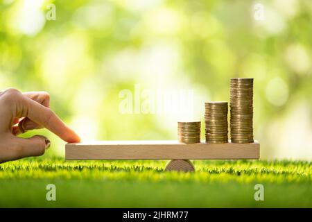 Leva finanziaria e equilibrio dell’inflazione. Concetto finanziario Foto Stock