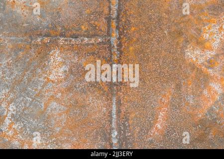 Processo saldatura lavoro scorie industria acciaio vecchio arrugginito lavorazione tessuto fondo. Foto Stock